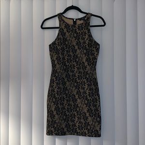 Tight fitting formal dress. Black and Tan lace
